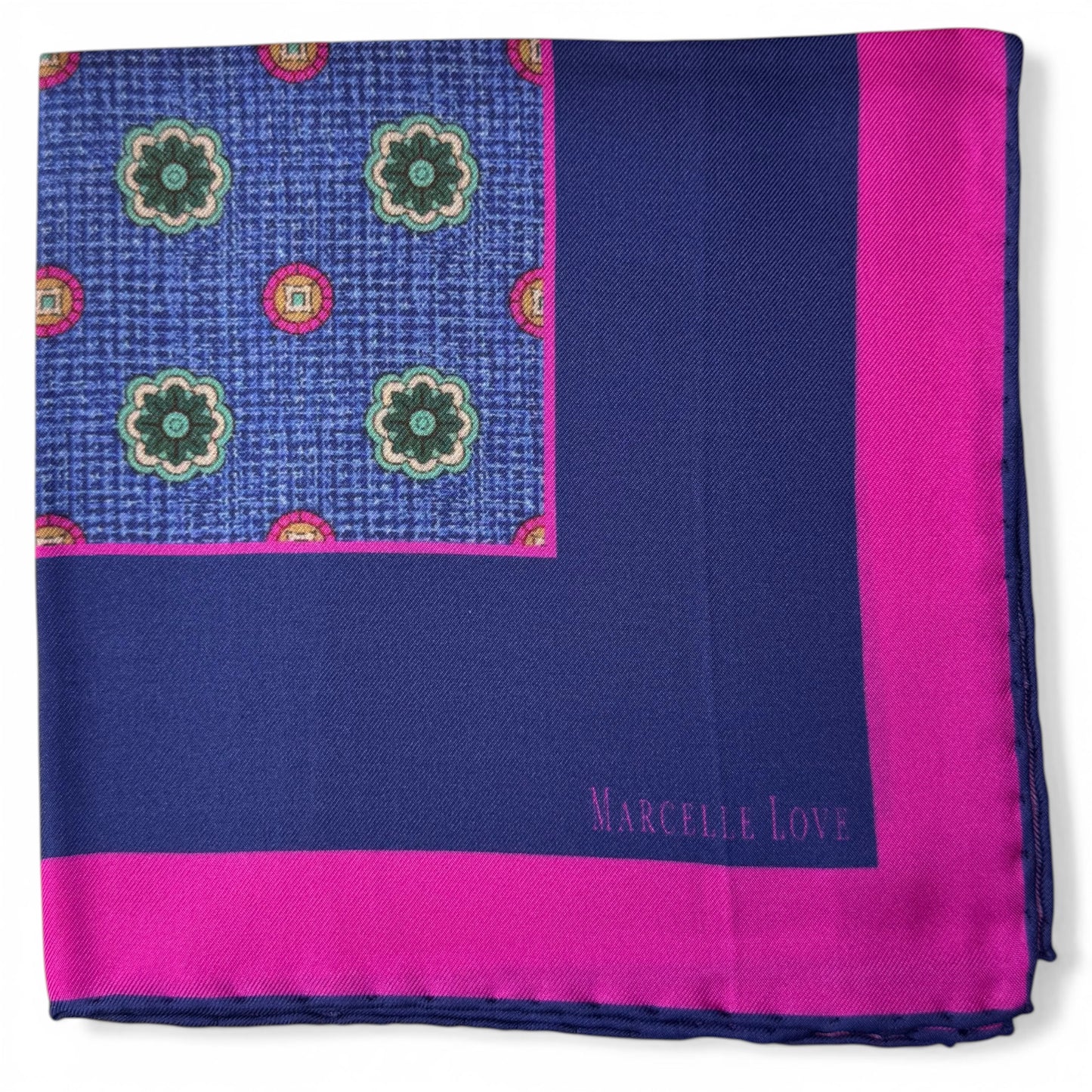 Navy and pink patterned fabric with 'Marcelle Love' branding
