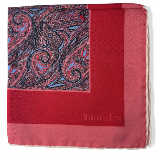 Red pocket square with paisley pattern and 'Marcelle Love' branding