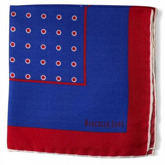 Blue and red pocket square with white polka dots and 'Marcelle Love' branding.