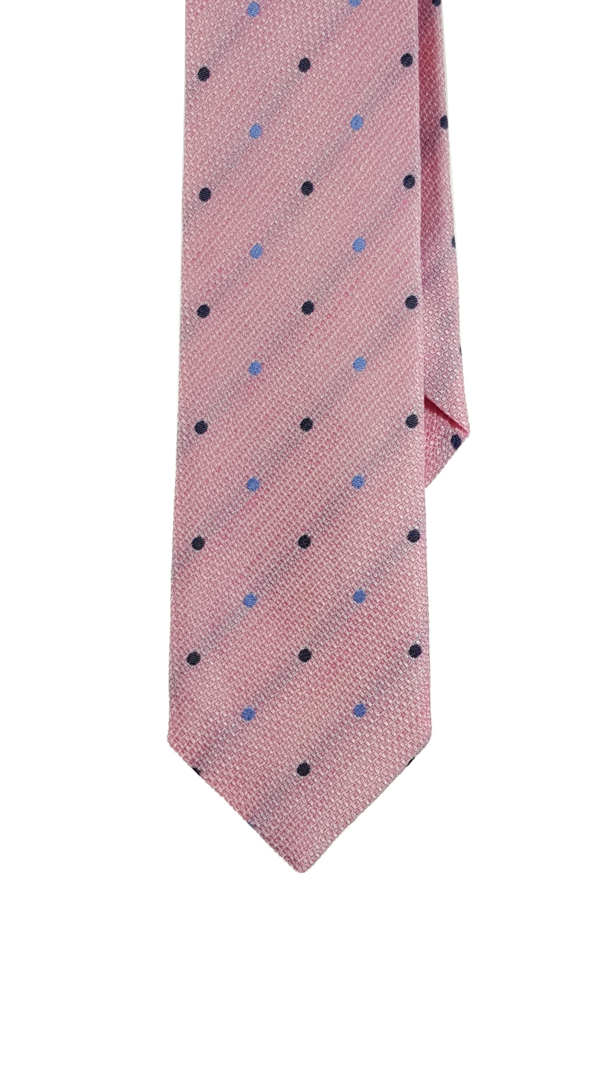A pink silk modern tie with a dotted pattern