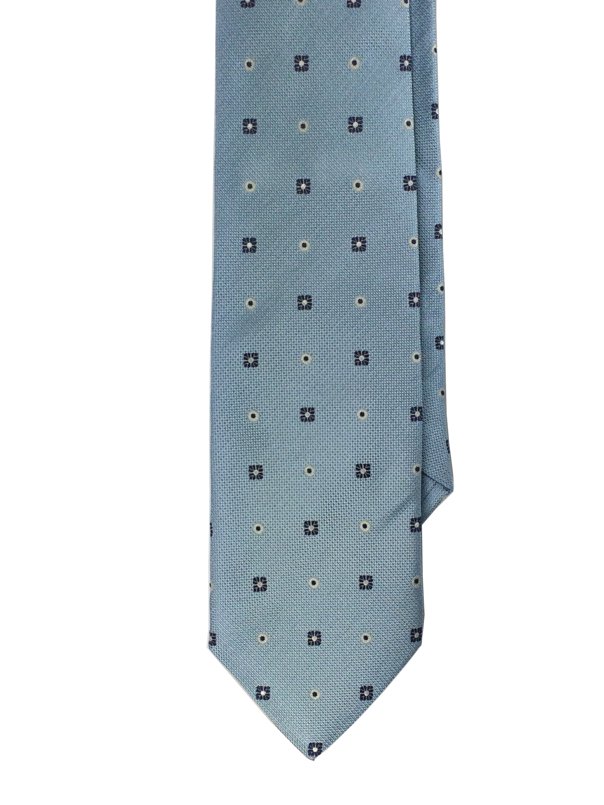 A sky blue traditional woven tie with a dot pattern