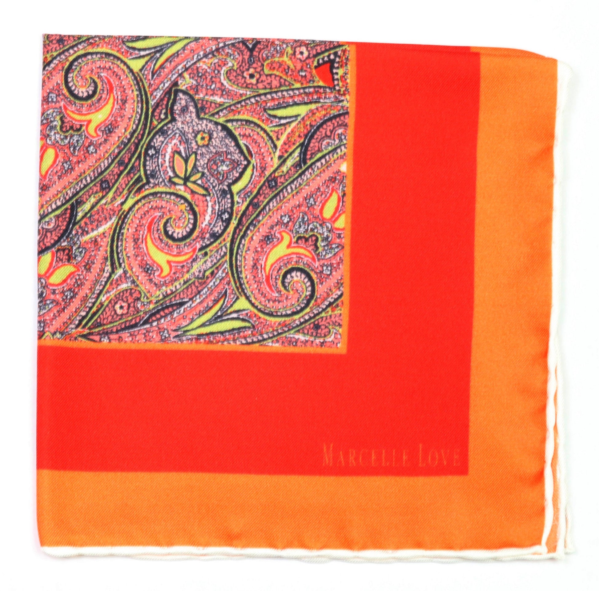 A red and orange pocket square with a paisley print and the brand name 'MARCELLE LOVE' printed at the bottom right corner. 