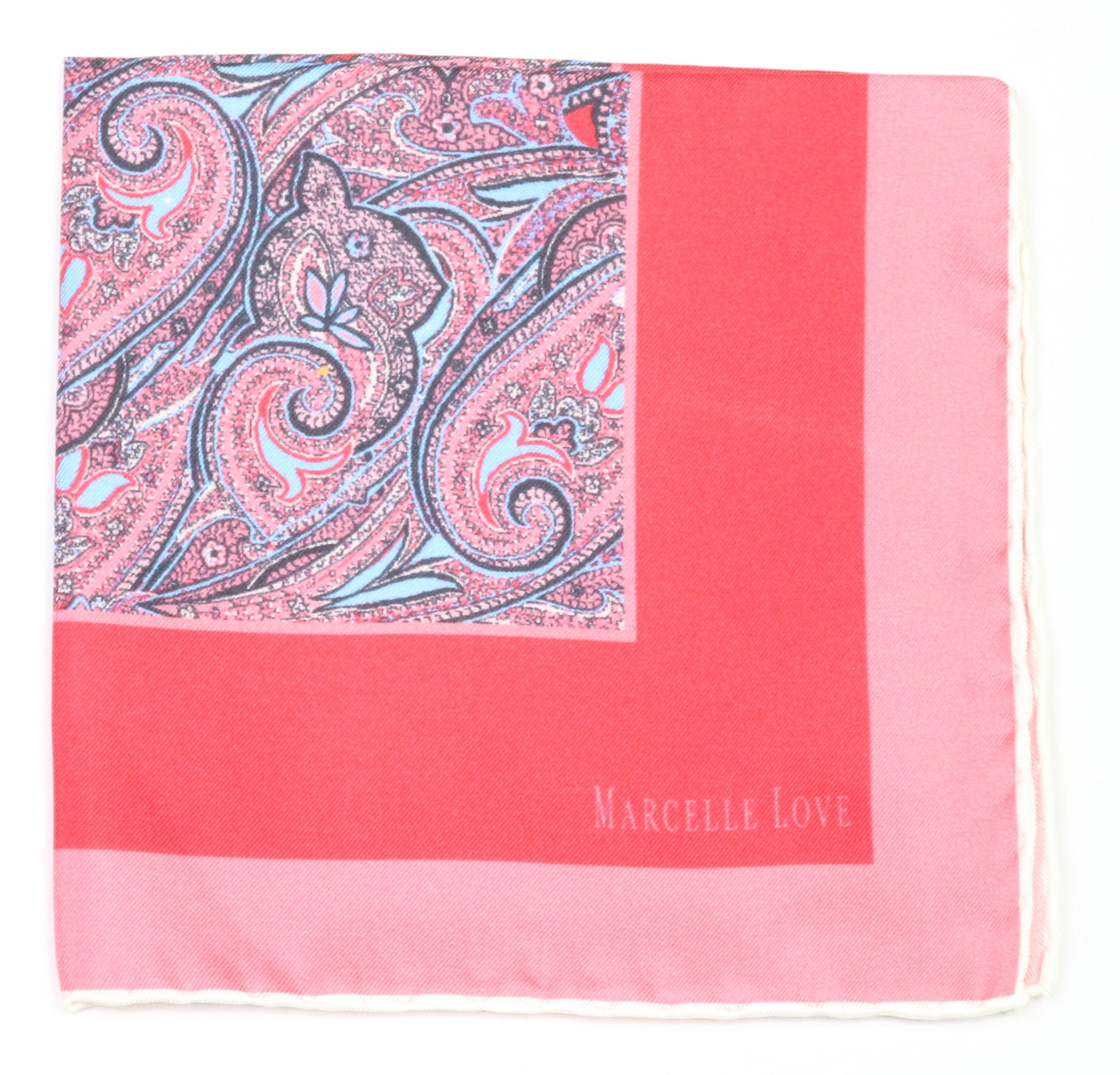 A pink pocket square with a paisley print and the brand name 'MARCELLE LOVE' printed at the bottom right corner.