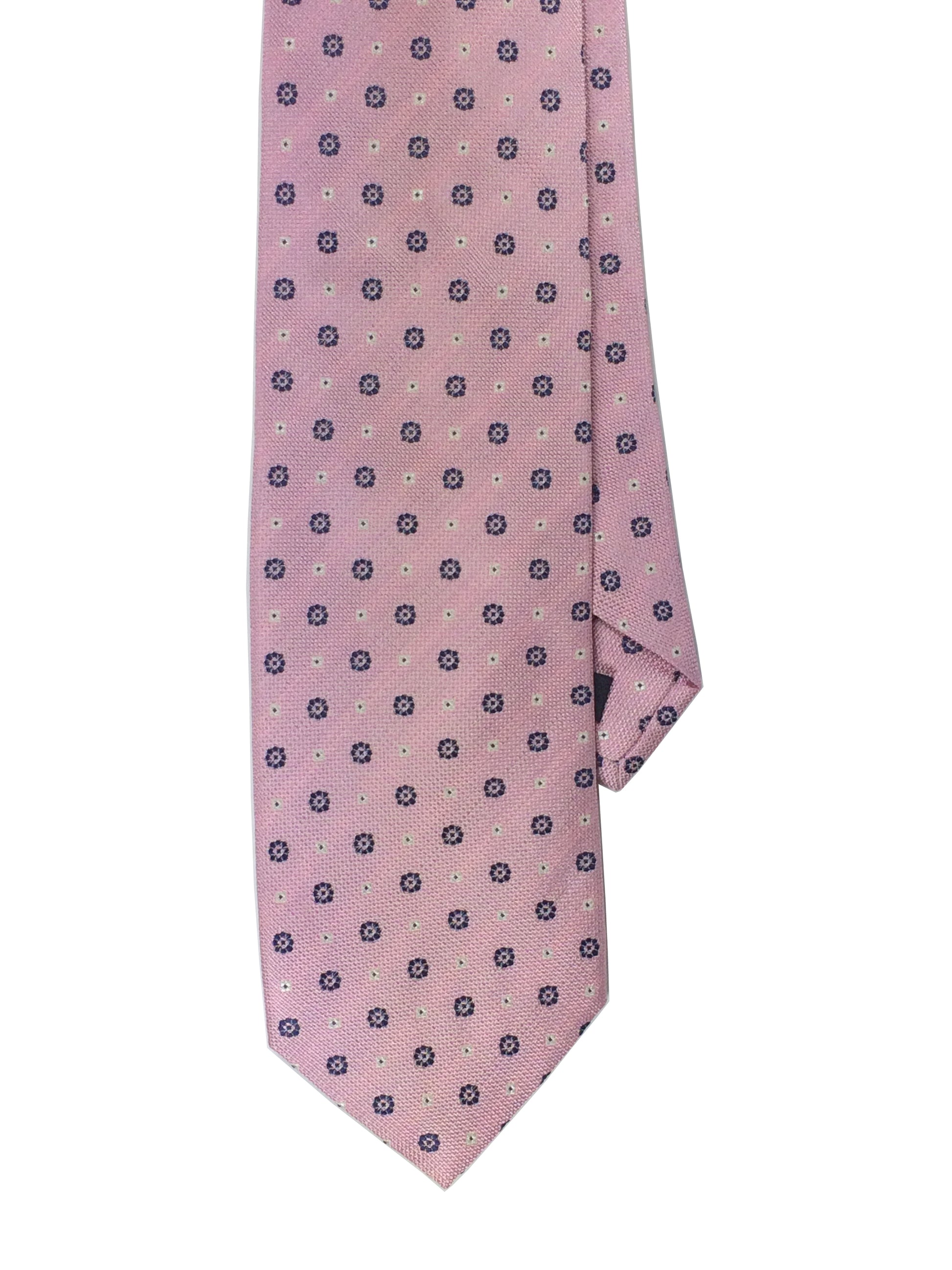 Pink woven silk tie with a navy dotted  pattern 