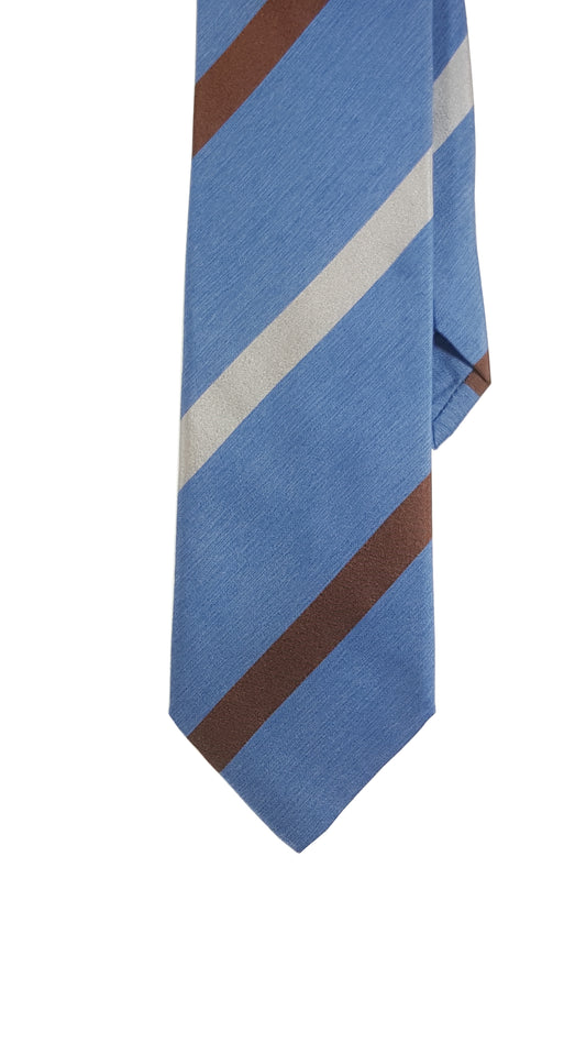 Sky blue modern silk tie with blue and red stripes.